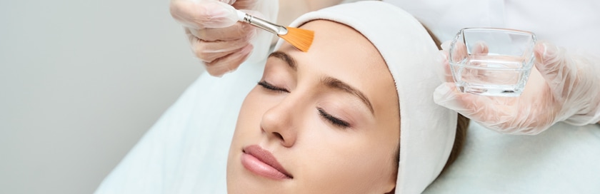 A woman getting a professional grade chemical peel.